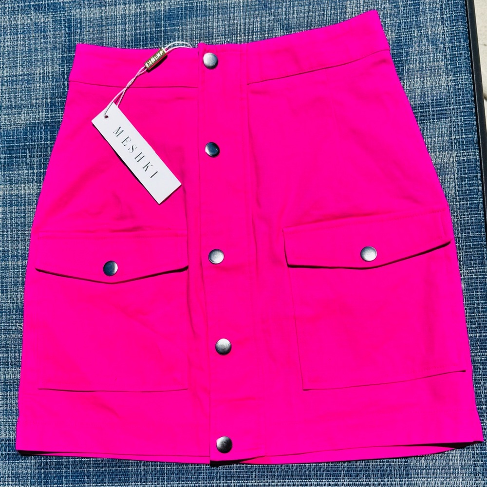 Meshki mini skirt from denim. Pink color.
